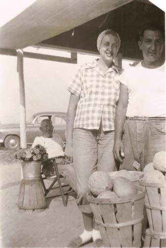 Angelo and Helen Monzo at the market, circa 1954